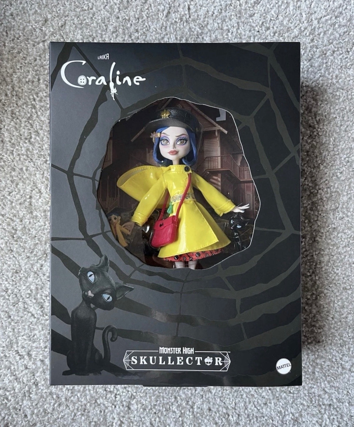 Monster High Skullector Coraline Collectible Doll in Yellow Raincoat with Cat